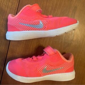 7 baby Nike pink sneakers